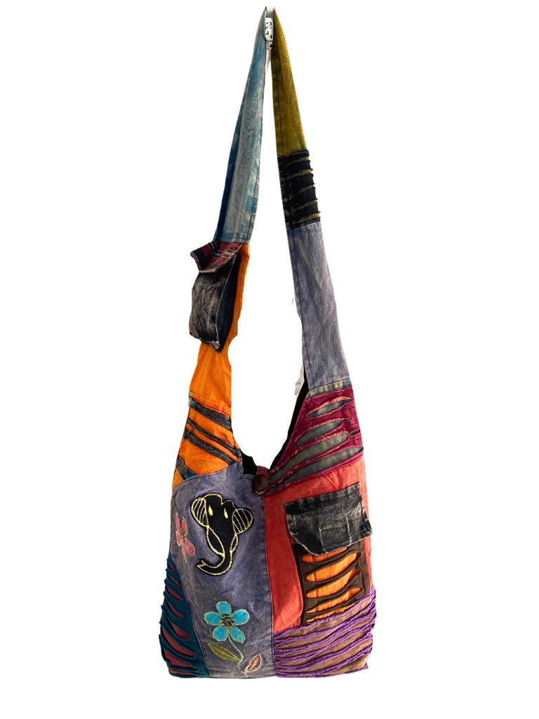 Patchwork razor cut shoulder bag