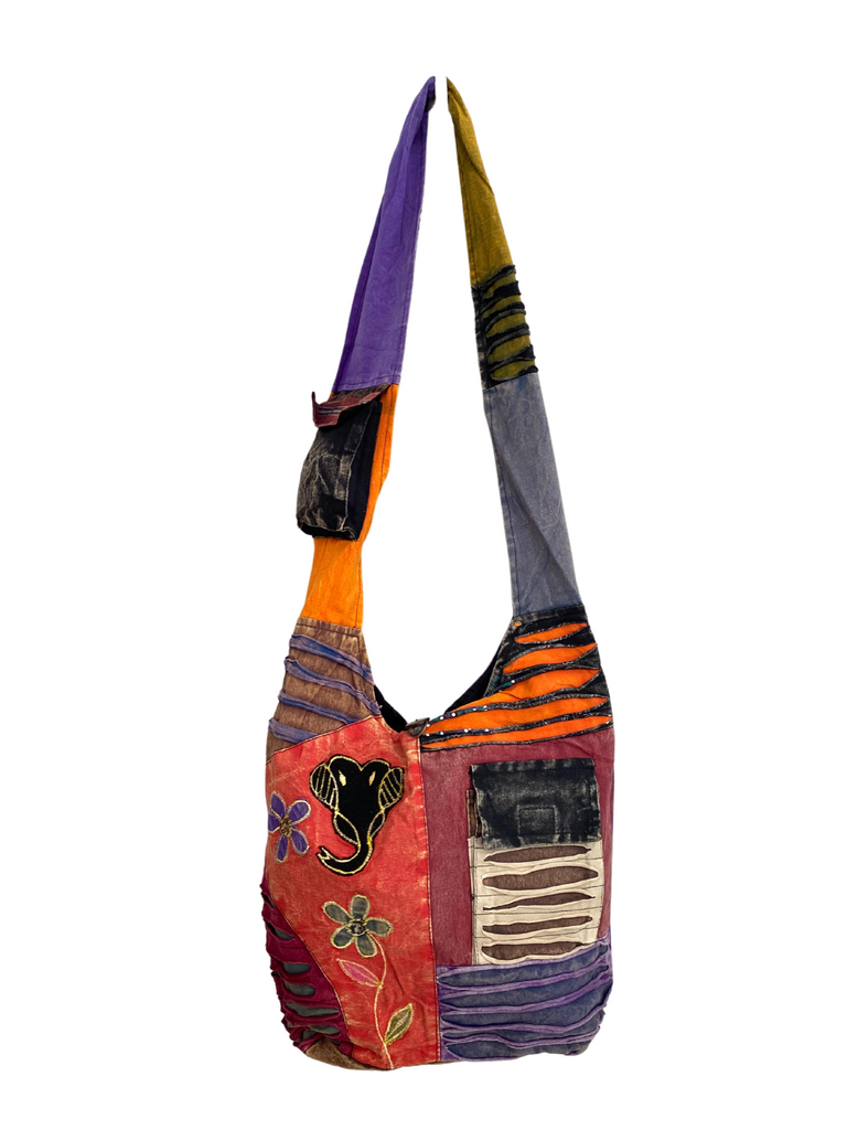 Patchwork razor cut shoulder bag