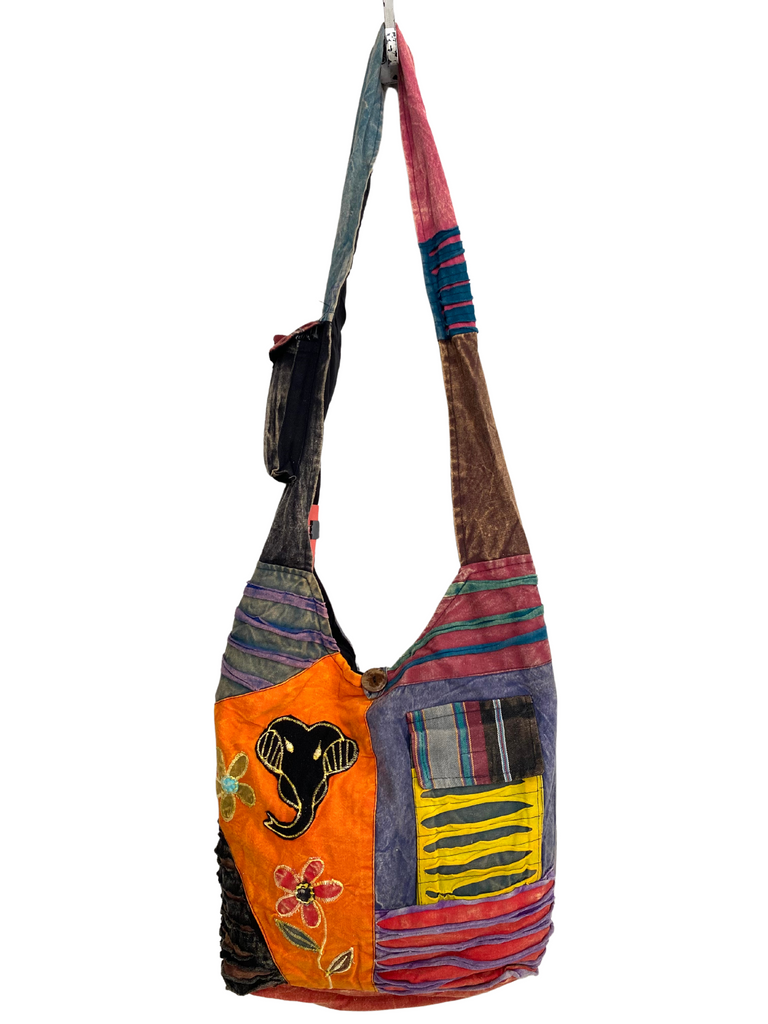 Patchwork razor cut shoulder bag