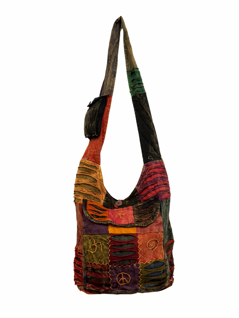 Patchwork razor cut shoulder bag