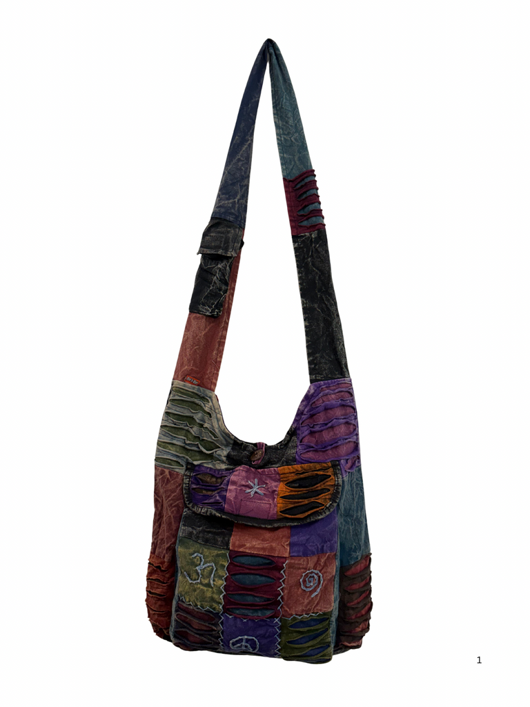 Patchwork razor cut shoulder bag
