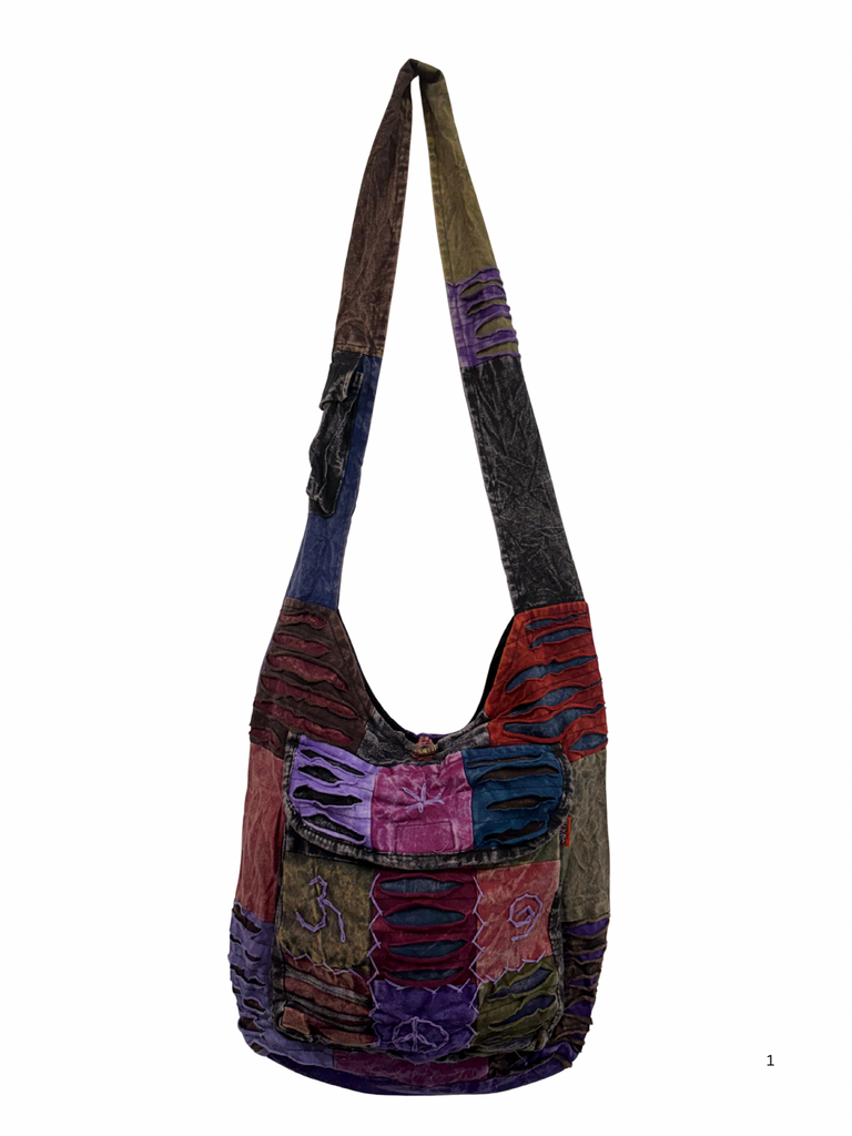 Patchwork razor cut shoulder bag
