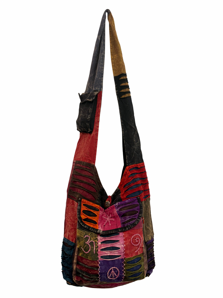 Patchwork razor cut shoulder bag