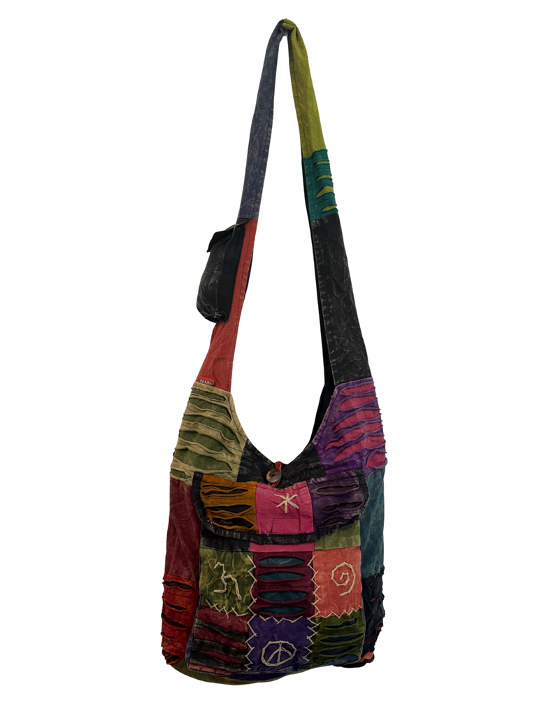 Patchwork razor cut shoulder bag