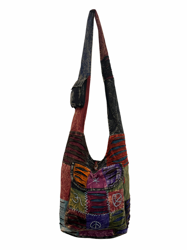 Patchwork razor cut shoulder bag