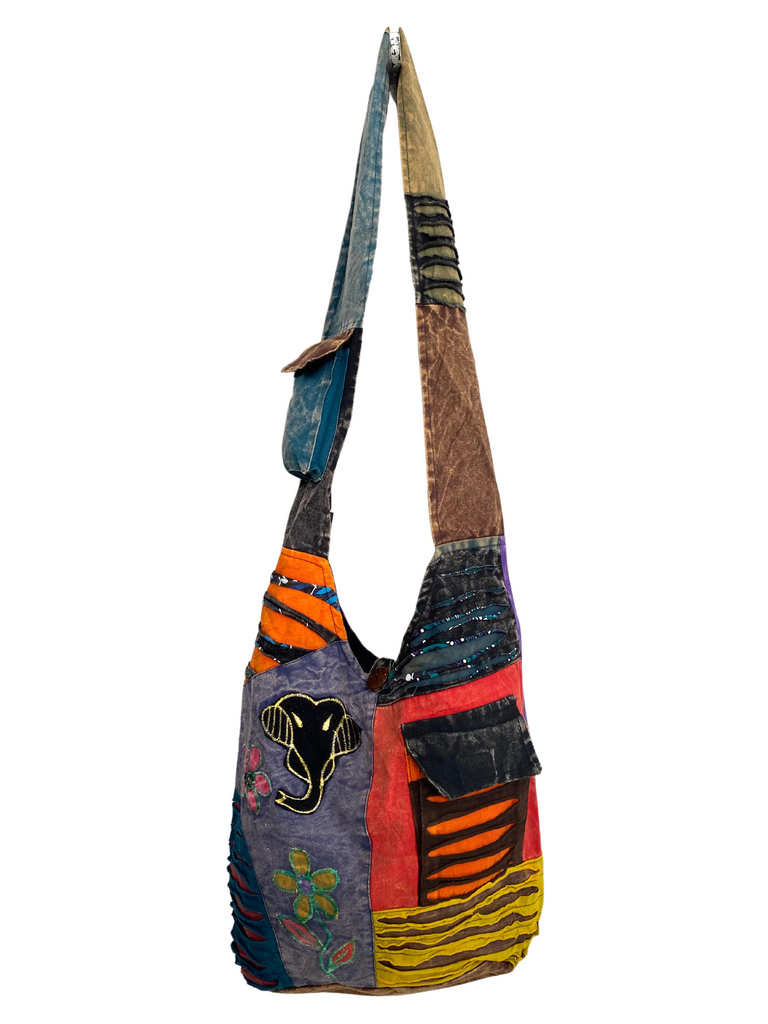 Patchwork razor cut shoulder bag